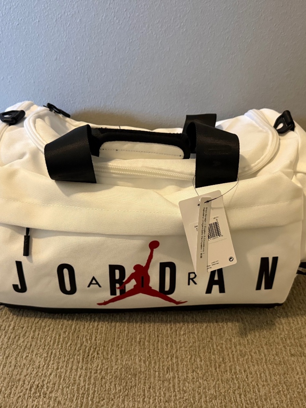 Jordan White and Black Duffel Bag with Red Jumpman Logo